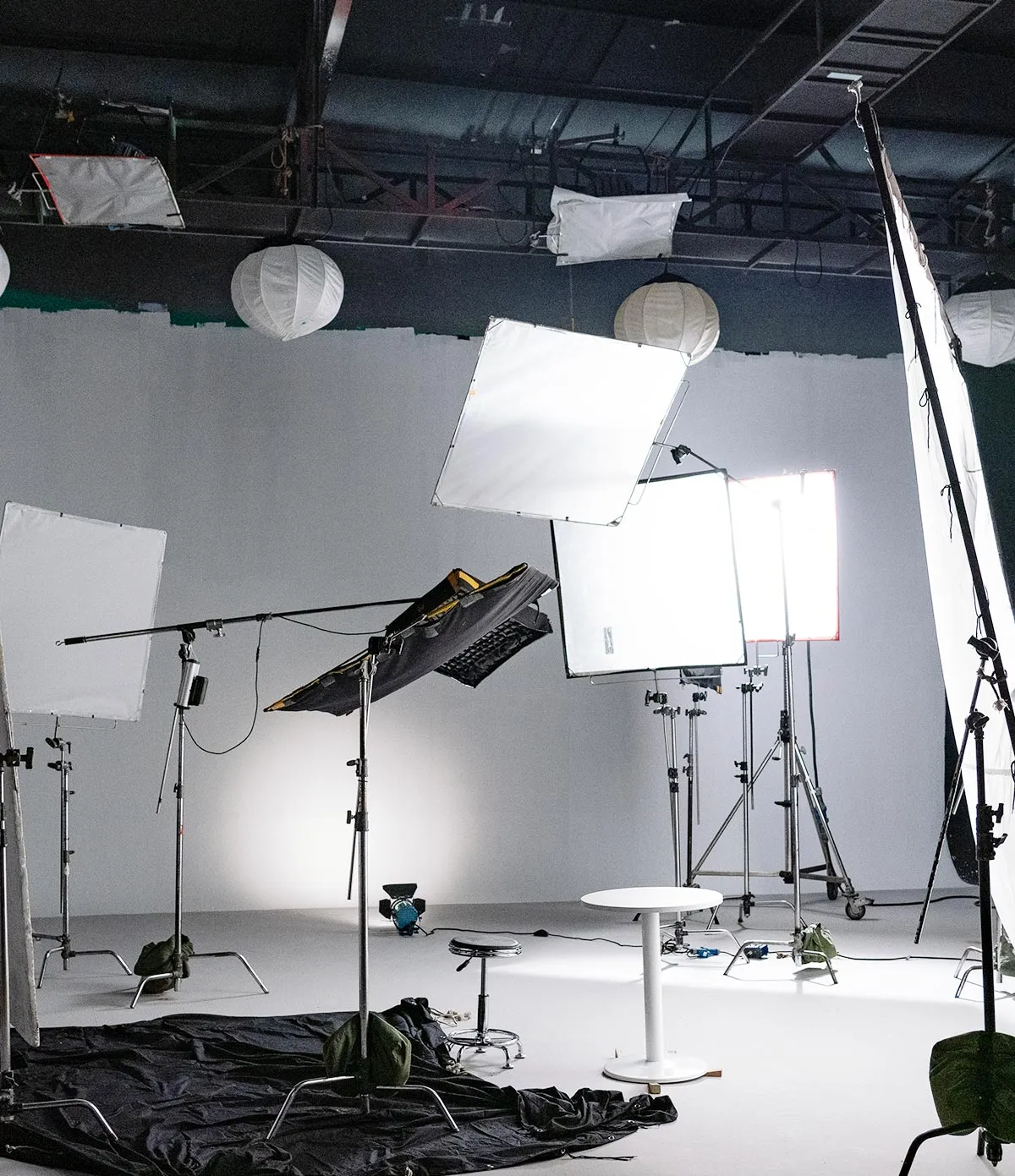 An artistic composition of studio lighting equipment.